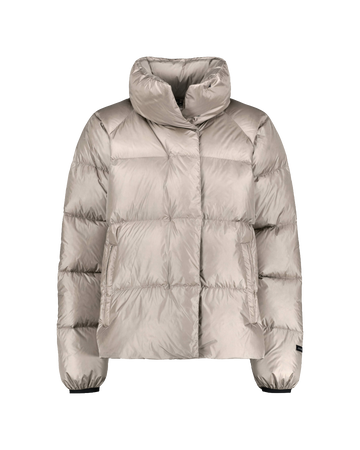 A light colored (color: champagne) down coat with a high stand-up collar, horizontal quilted baffles, and elasticated cuffs.