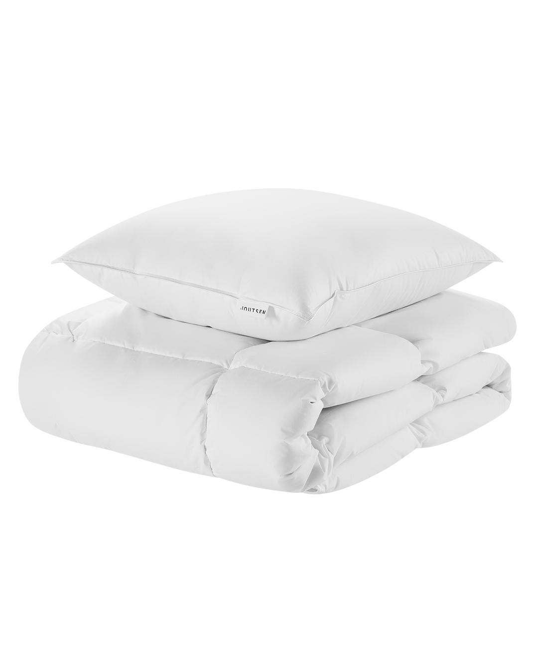 The Syli set includes a white pillow and a matching duvet. The pillow has a smooth, plump shape with a small fabric label on the side, while the duvet is neatly folded to show its soft, quilted structure.