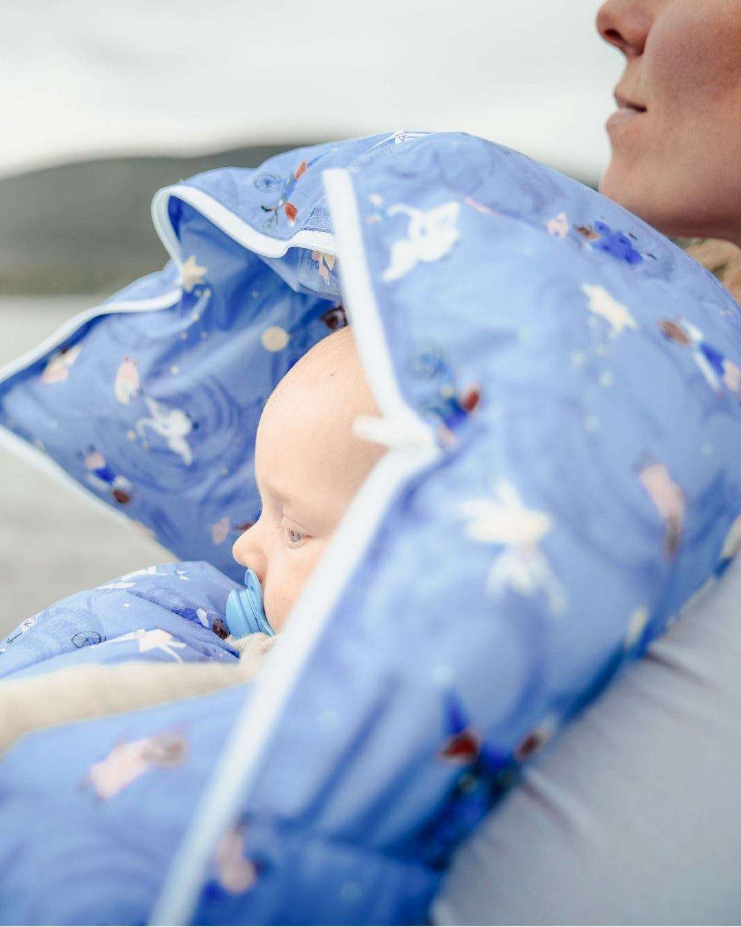 Untenmaille baby åkpåse dun